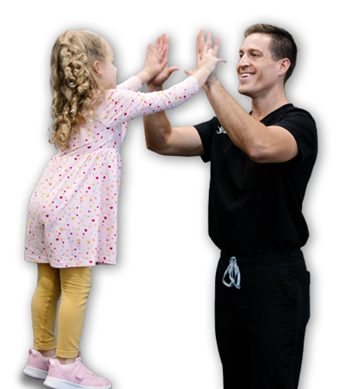 Chiropractor Overland Park KS Joshua Whitmore With Little Girl